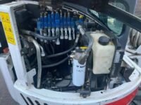 mini pelle bobcat 430 avec lamier taille haie